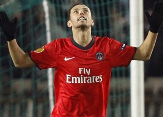 Paris St Germain's Nene celebrates after scoring against Sevilla during the Europa League Group J soccer match at Parc des Princes stadium in Paris